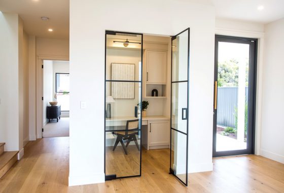Office with Glass Doors with Black Frame — Cove Magazine In Sanctuary Cove, QLD